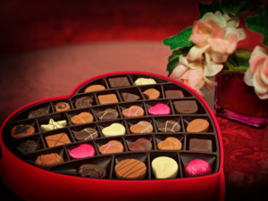 box of chocolates and flowers